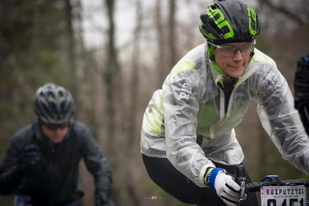 Val racing the Rasputitsa gravel race in the rain